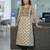Cream ethnic motifs printed sequinned pure cotton a-line kurta