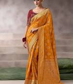 mustard crepe designer saree with patterned blouse