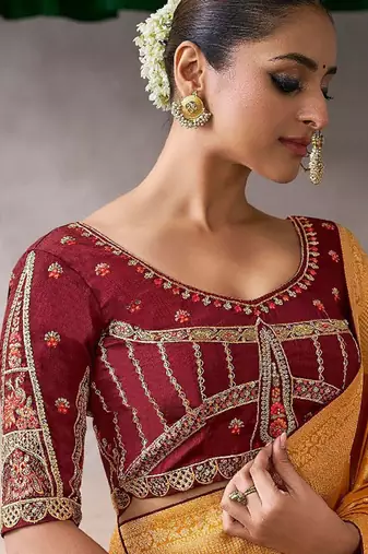 mustard crepe designer saree with patterned blouse