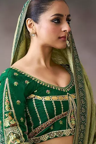 olive crepe designer saree with patterned blouse