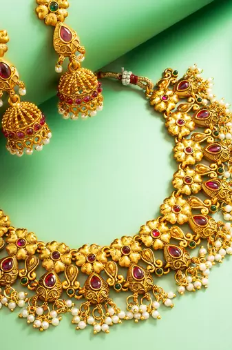 gold plated floral leaf choker necklace set with jhumka earrings