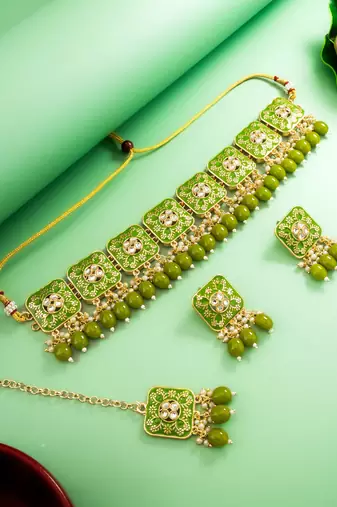 green meenakari kundan choker necklace set with earrings and maangtika