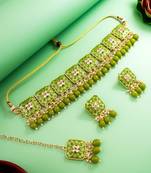 green meenakari kundan choker necklace set with earrings and maangtika