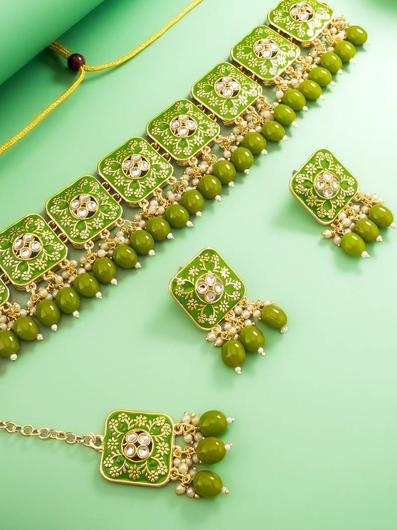 green meenakari kundan choker necklace set with earrings and maangtika