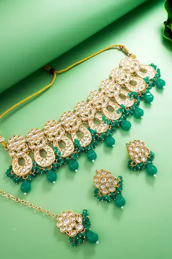 green kundan choker necklace set with earrings and maangtika
