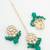 green kundan choker necklace set with earrings and maangtika