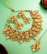 antique gold lakshmi temple necklace set with earrings and maangtika