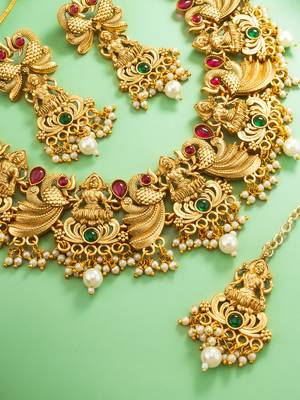 antique gold lakshmi temple necklace set with earrings and maangtika 2