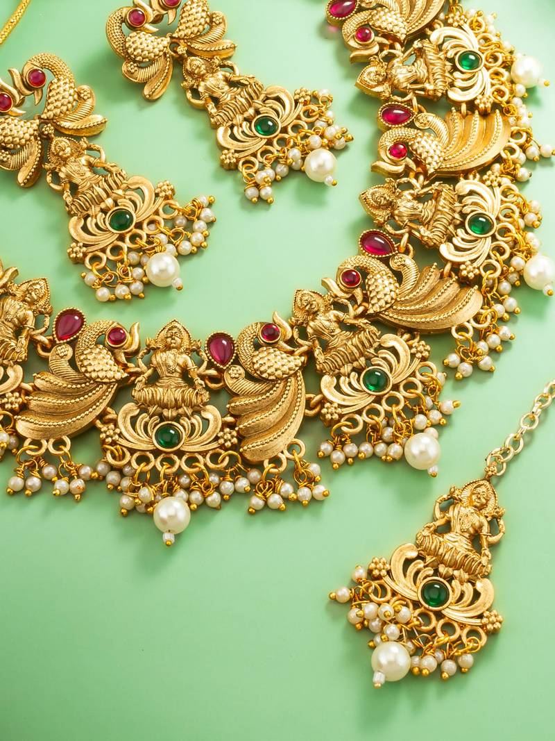 antique gold lakshmi temple necklace set with earrings and maangtika