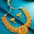 gold plated temple motif necklace set with earrings