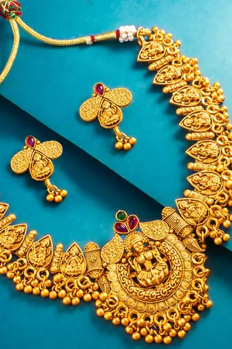 gold plated temple motif necklace set with earrings