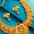 gold plated temple motif necklace set with earrings