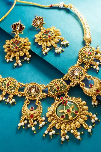 lotus motif crescent drop necklace set with earrings