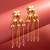 delicate kundan floral chandelier earrings with pink bead tassels