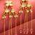 delicate kundan floral chandelier earrings with pink bead tassels