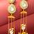 kundan green teardrop chandelier earrings with ghungroo tassels