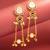 kundan peach stone chandelier earrings with layered chain drops for party wear