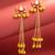 maroon crescent moon kundan chandelier earrings with gold bell tassels