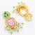 purple and green ad statement drop earrings with beaded fringe