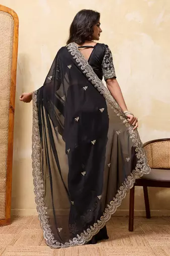 Black embroidered saree with intricate gold & silver scalloped border
