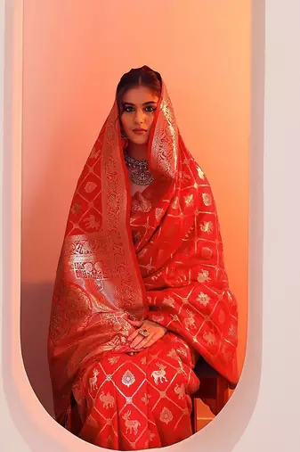 Red Woven Design Saree With Unstitched Blouse Piece
