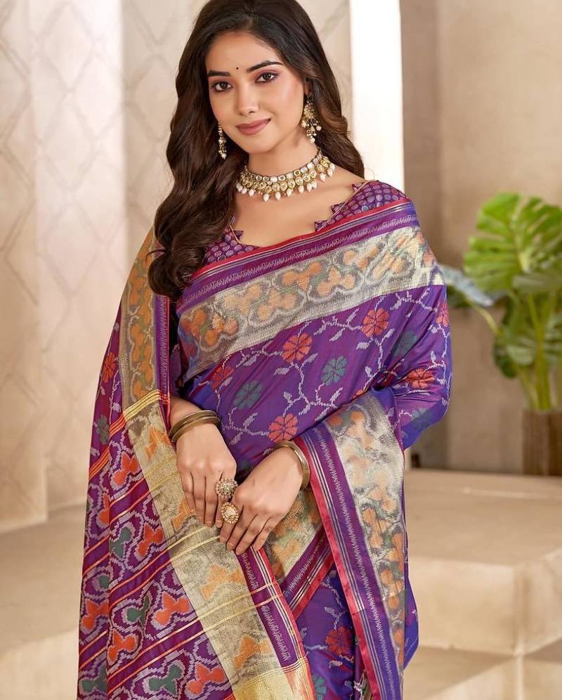 Purple color flower patola silk woven work saree with blouse piece