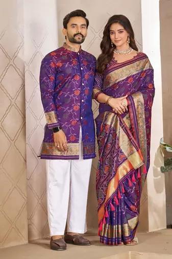 Purple color flower patola silk woven work saree with blouse piece