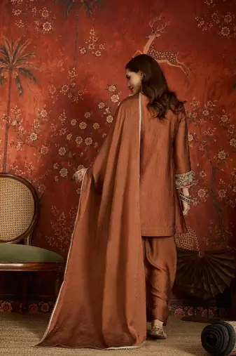 Rust color beautiful ceremonial heavy embroidered ceremonial salwar kameez