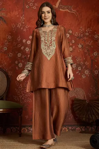 Rust color beautiful ceremonial heavy embroidered ceremonial salwar kameez