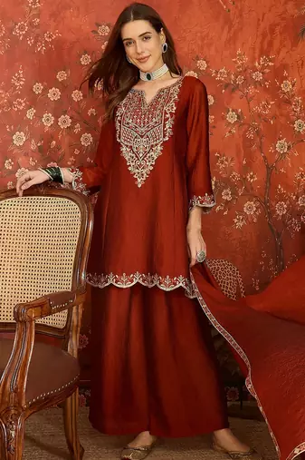 Rust color beautiful ceremonial heavy embroidered ceremonial salwar kameez