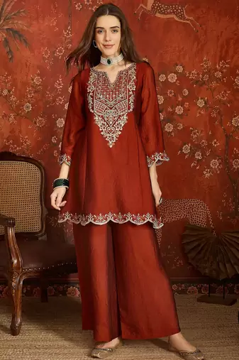 Rust color beautiful ceremonial heavy embroidered ceremonial salwar kameez