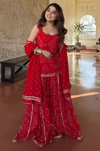 Red color georgette fabric printed graceful partywear attire for girls