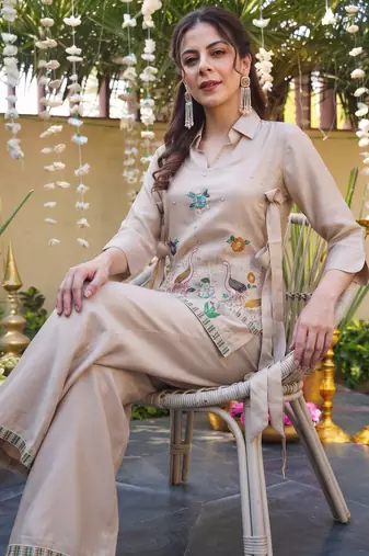 Cream color viscose fabric designer embroidery work graceful partywear attire for girls