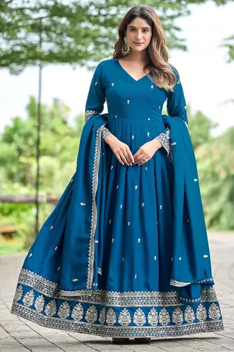 Blue color fancy ceremonial art silk fabric gown with dupatta