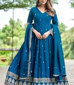 Blue color fancy ceremonial art silk fabric gown with dupatta