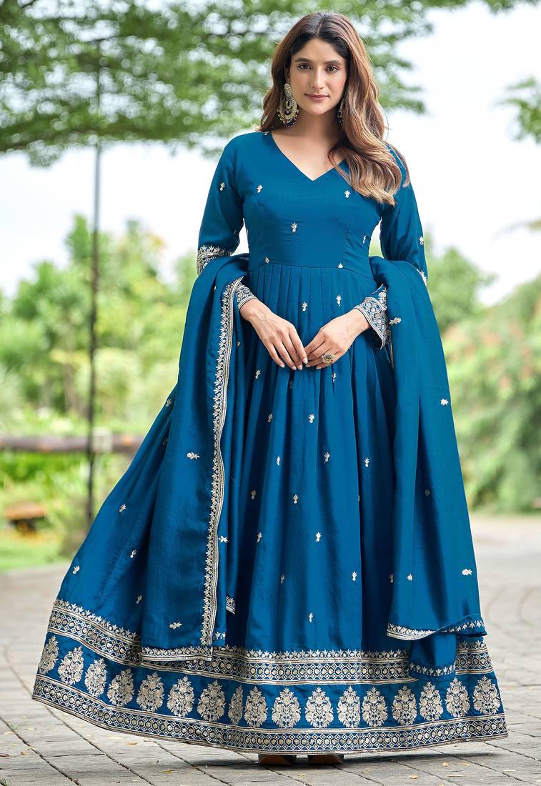 Blue color fancy ceremonial art silk fabric gown with dupatta