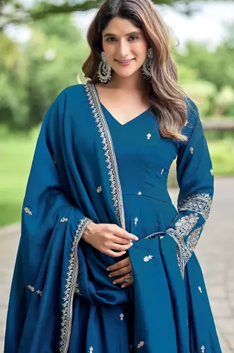 Blue color fancy ceremonial art silk fabric gown with dupatta