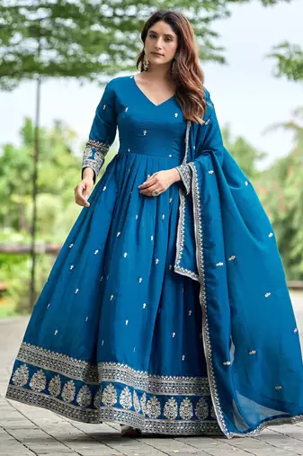 Blue color fancy ceremonial art silk fabric gown with dupatta