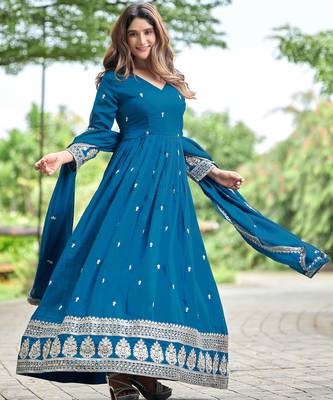 Blue color fancy ceremonial art silk fabric gown with dupatta 5