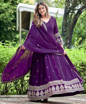 Purple color fancy ceremonial art silk fabric gown with dupatta 4