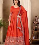 Rust color fancy ceremonial art silk fabric gown with dupatta