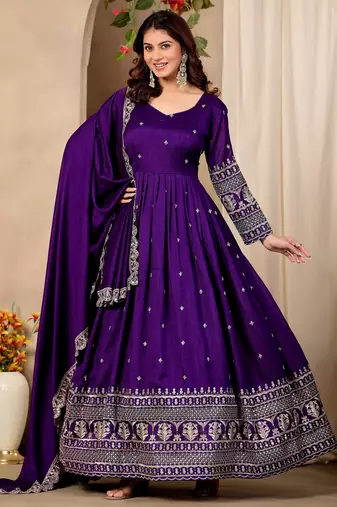 Purple color fancy ceremonial art silk fabric gown with dupatta