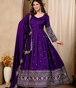 Purple color fancy ceremonial art silk fabric gown with dupatta