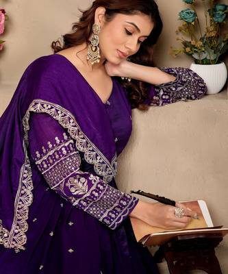Purple color fancy ceremonial art silk fabric gown with dupatta 3