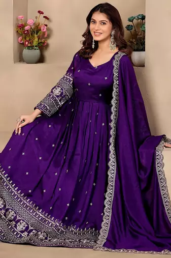 Purple color fancy ceremonial art silk fabric gown with dupatta