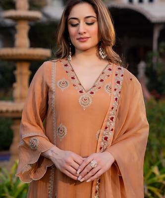 Peach color smart graceful kurta set for trendy girlie looks 3