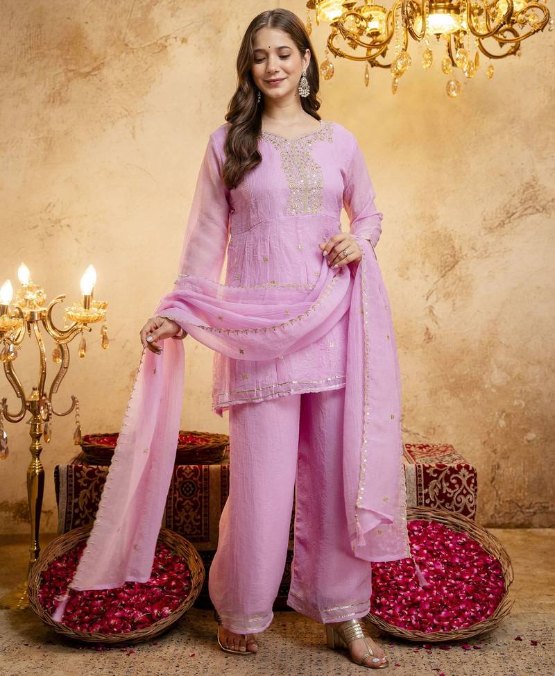 Pink color smart crunchy fabric designer graceful partywear suit for trendy girlie looks