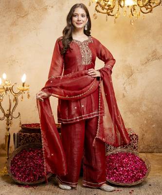 Rust color smart crunchy fabric designer graceful partywear suit for trendy girlie looks 1
