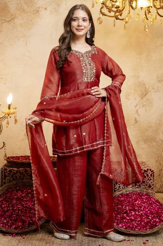 Rust color smart crunchy fabric designer graceful partywear suit for trendy girlie looks