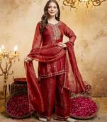 Rust color smart crunchy fabric designer graceful partywear suit for trendy girlie looks
